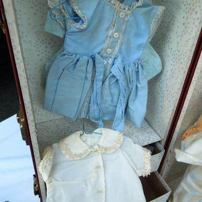 Lot 230: 1960's Metal Doll Case, Doll and Homemade Doll Clothes