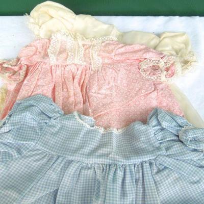 Lot 231: 1960's Latex Doll, Case and Homemade Clothes