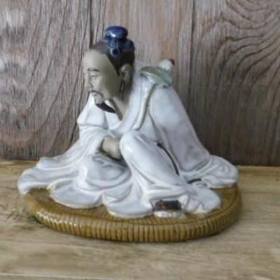 Asian Elder Holding Plant Porcelain Figurine 