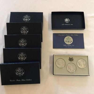 Lot 23 - 1983 Olympic 3 Coin Sets