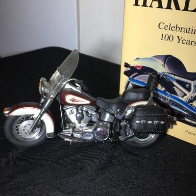 Harley Davidson Hardcover book, telephone, mug and collector bike