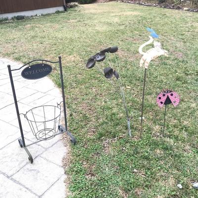 Lot 101 - Metal Garden Art and Iron Baskets