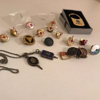 Lot 42 - Lighters, Pins and Pendants
