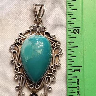 Huge sterling turquoise pendant.
