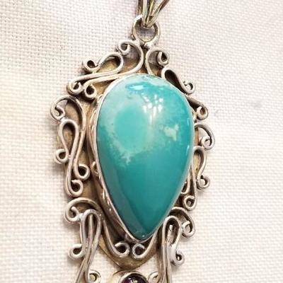 Huge sterling turquoise pendant.