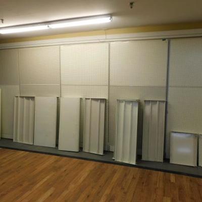 Section Three:   Five Panels of 4x8 Display Wall,, Peg Board, Hardware  20'x8'. 