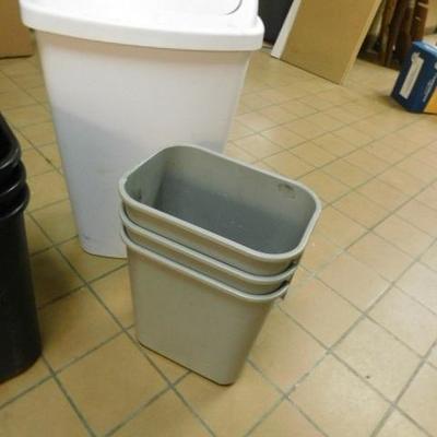 Set of Seven Trash Receptacles of Various Size and Color