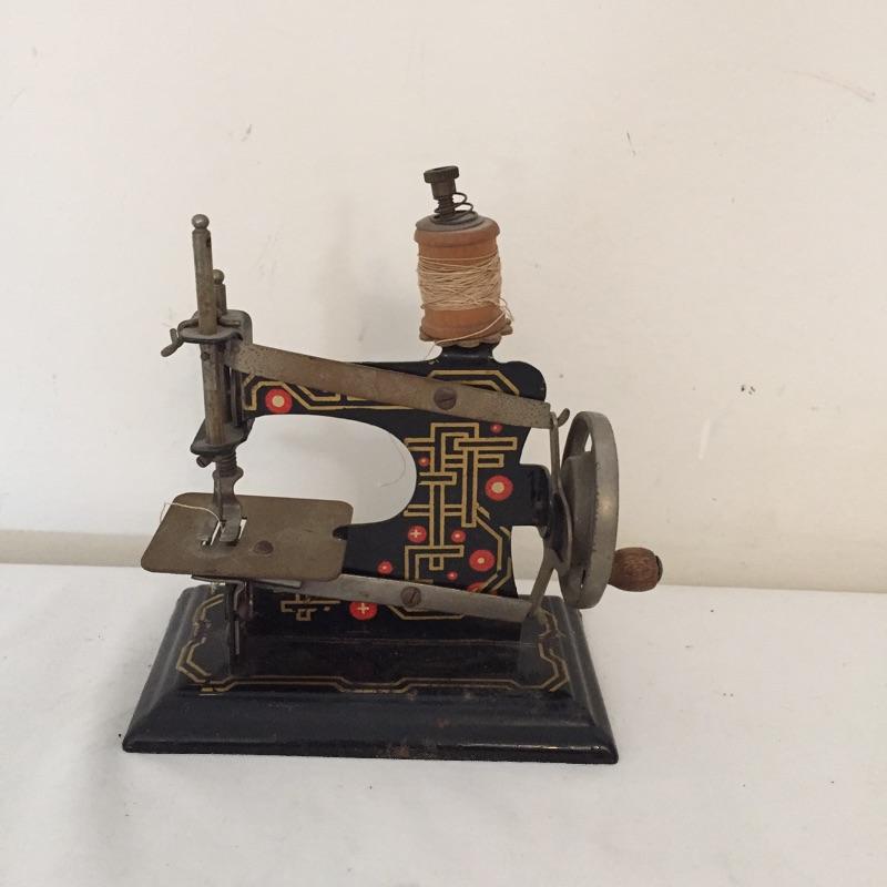 Lot 177 - Two Mini Sewing Machines | EstateSales.org