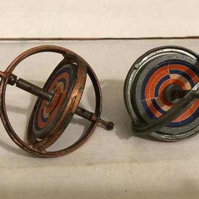 Set of 2 Vintage Metal Spinning Metal Top Toys