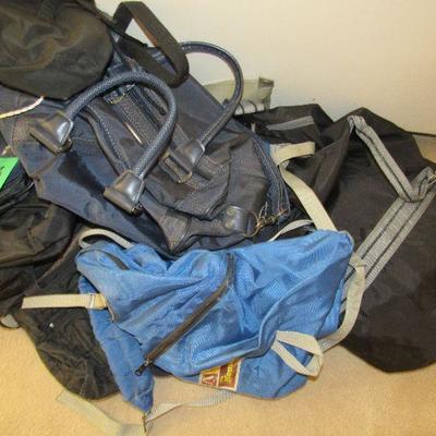 Lot 43 Large lot of book bags/bags