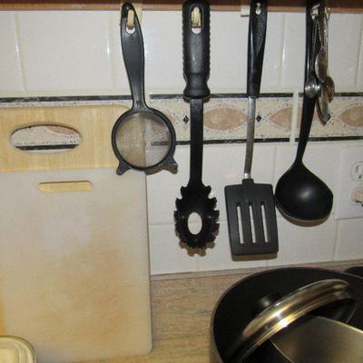 Lot 58 Large lot Kitchen items, microwave, glasses, pots, pans & utensils 