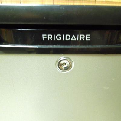 Lot 210: Frigidaire 33" x 22" Mini Refrigerator with Ice Box