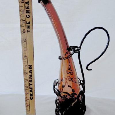 Lot 63: Moroccan Amber Glass Decanter with Iron Stand and Grass Serving Tray