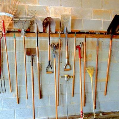 Lot 49: Wall of Quality Wood Handled Garden and Yard Tools