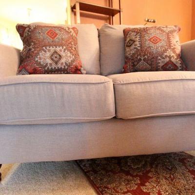 Lot 121: Ashley Light Cocoa Contemporary Couch and Loveseat