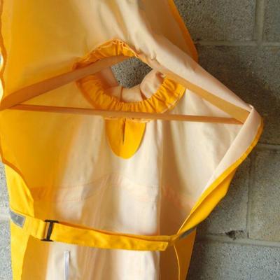 Lot 33: Two Dog Coats, Grooming Towel and Plastic Wagon