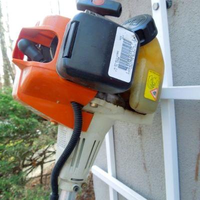 Lot 42: Stihl FS 75 Trimmer, B & D Cordless Trimmer and Gas Can