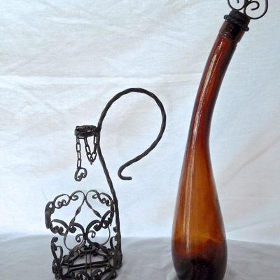 Lot 63: Moroccan Amber Glass Decanter with Iron Stand and Grass Serving Tray