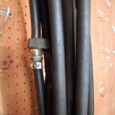 Lot 56: Neoprene Garden Hoses Soaking and Two Regular 500 Ft