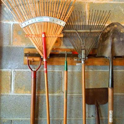 Lot 49: Wall of Quality Wood Handled Garden and Yard Tools