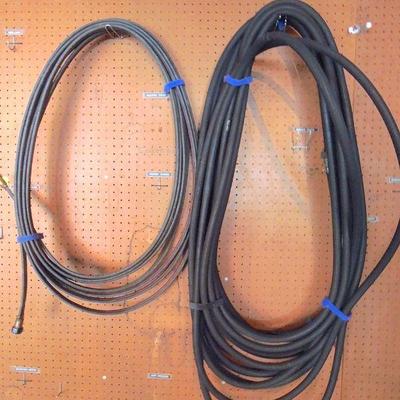 Lot 56: Neoprene Garden Hoses Soaking and Two Regular 500 Ft