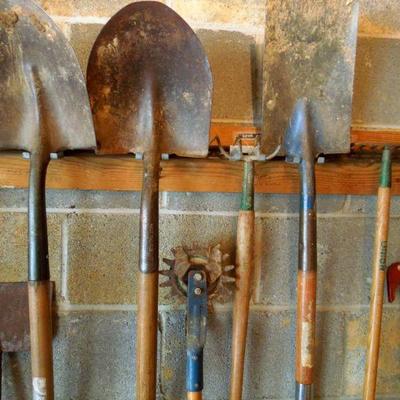 Lot 49: Wall of Quality Wood Handled Garden and Yard Tools