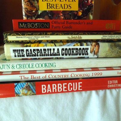Lot 157: Cook Books, Wall Shelf and Gerber Daisies in Basket