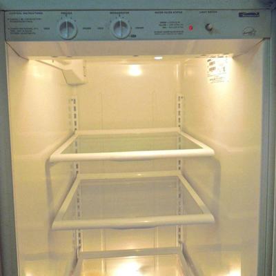 Lot 58: Kenmore Coldspot Side by Side Refrigerator Freezer 