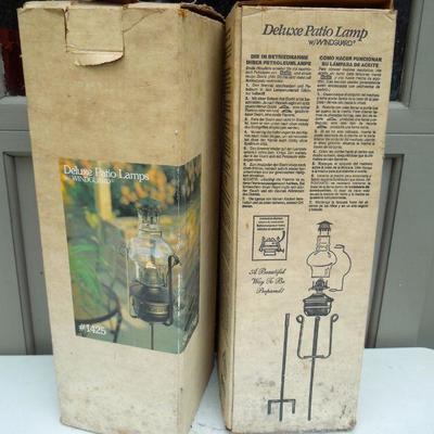 Lot 60: Two Deluxe Patio Hurricane Oil Lamps on Iron Pole