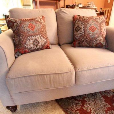 Lot 121: Ashley Light Cocoa Contemporary Couch and Loveseat