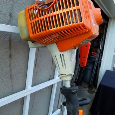 Lot 42: Stihl FS 75 Trimmer, B & D Cordless Trimmer and Gas Can