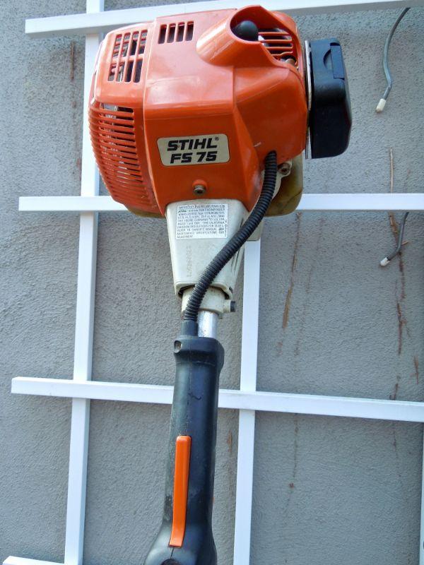 Lot 42 Stihl FS 75 Trimmer, B & D Cordless Trimmer and Gas Can