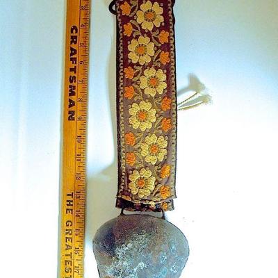 Lot 227: Antique Primitive Swiss Cow Bell on Embroidered Pull