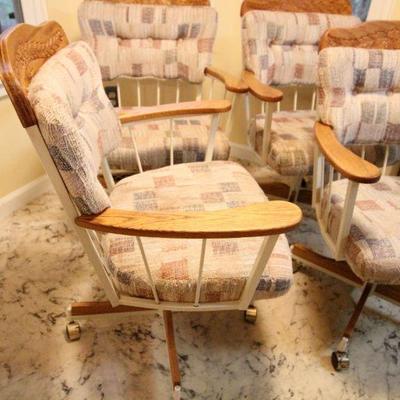 Lot 131: Vintage Embossed Wood Octagonal Kitchen Table and Padded Swivel Chairs