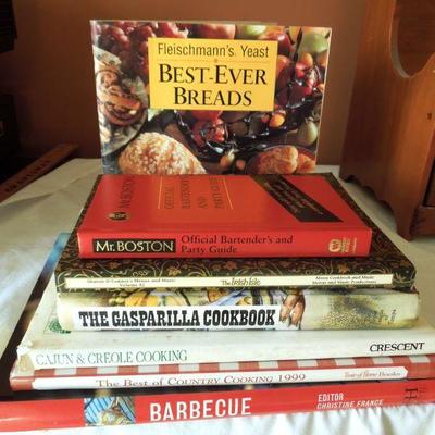 Lot 157: Cook Books, Wall Shelf and Gerber Daisies in Basket
