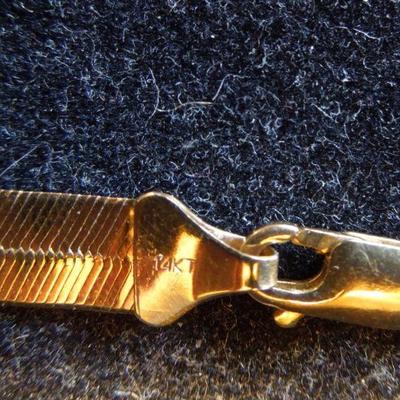 Lot 204: 14 Karat Gold 20" Snake Flat Chain Necklace 19 grams