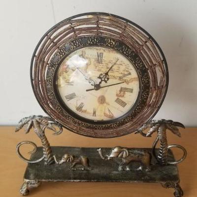 Lot 76 - Tin Desk Cloxk with Elephant 