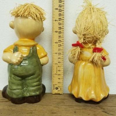 Lot 119 - Ceramic boy and girl
