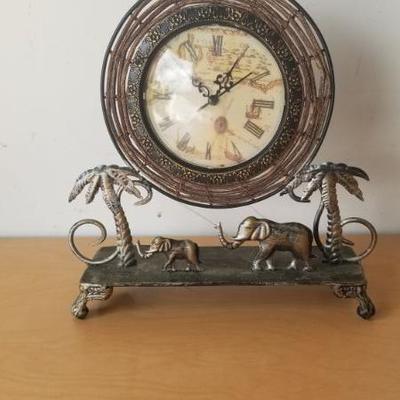 Lot 76 - Tin Desk Cloxk with Elephant 