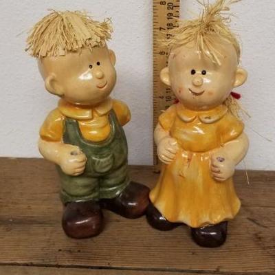 Lot 119 - Ceramic boy and girl
