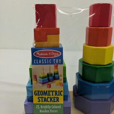 Melissa & Doug Geometric Stacker, 25 Brightly Colored Wooden Pcs, Ages 2+ - New