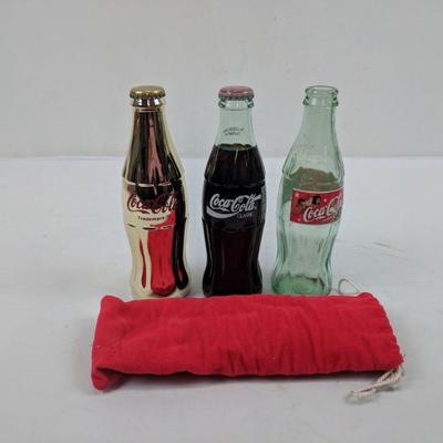 3 Coca-Cola Bottles, Gold Park City w/Holder, 1996 Olympic, & 2000 Xmas Edition