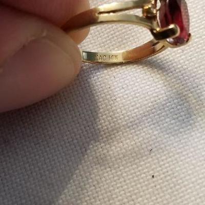 14k yellow gold garnet ring.