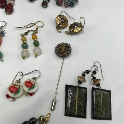 Lot 61 - Glass Button and More Artistic Earrings and Jewelry 