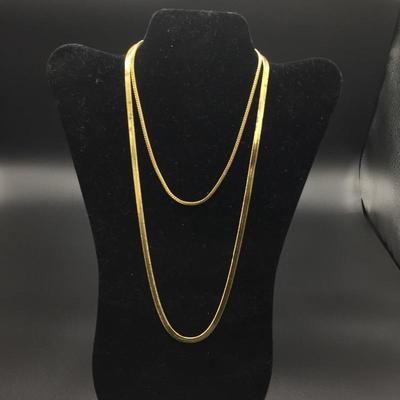 Lot 106 - Pair of Gold Necklaces and Gold Bracelet 