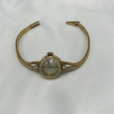 Lot 62 - Bucherer Gold Watch with Diamonds 