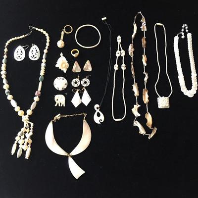 Lot 60 - Carved Jewelry 