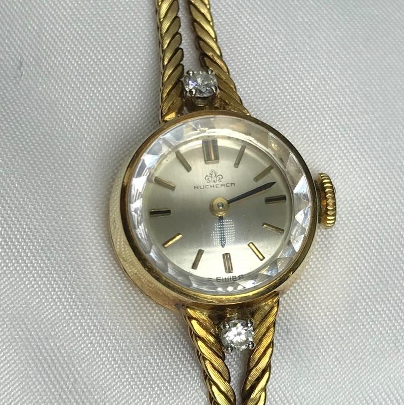 Lot 62 - Bucherer Gold Watch with Diamonds | EstateSales.org