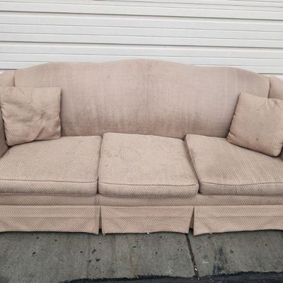 Light Brown Couch with 2 Pillows. Non Smoking Home, Needs Cleaning