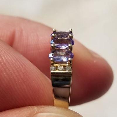 14k gold, tanzanite and diamonds.